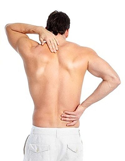 A man touching areas on his back where pain is felt.